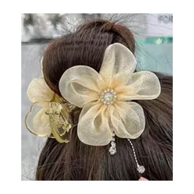 Gele bloem haarklem met glinsteringen