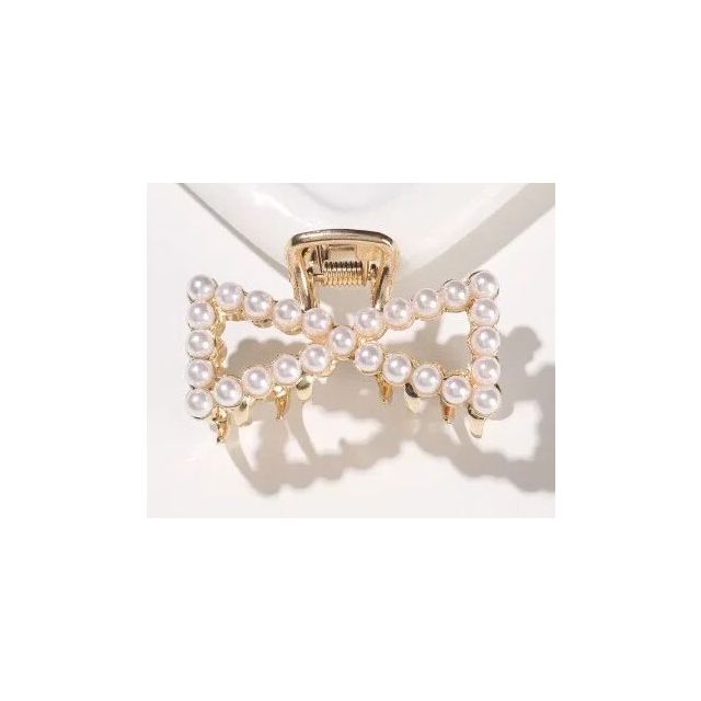 Gouden haarklem strikje parel