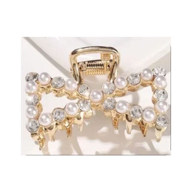 Gouden haarklem strikje parel/ strass